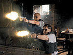 LOST ACTION HEROES Pegg, left, and Frost blaze up.