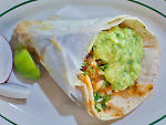 Birria de res taco at Taqueria CoatzingoAt this top-notch taqueria, beef simmers with dried guajillo peppers and avocado leaf for three hours, until the meat is tender and infused with aromatics. The saucy, spicy stew is finished with a sprinkling of cila