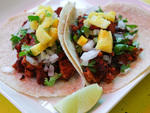 Al Pastor taco at Tortilleria NixtamalSome of the best Mexican restaurants in town use the tortillas made at this factory. Go straight to the source Fridays through Sundays, when Nixtamal's small caf offers tacos al pastor: marinated pork butt roasted on 
