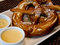 Homemade NY-Style pretzels at Ardesia Putting legions of street carts to shame, Ardesia's burnished pretzel twists are flecked with Maldon salt and served with spicy Dijon and a cheddar-Gruyre sauce in place of yellow mustard. Warm, yeasty and pleasantly 