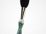 We can't help but admire this handmade blown-glass handle, which is like an objet d'art itself. Engler Glass blown-glass makeup brush, $48, at anthropologie.com