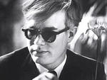 Andy WarholA shock of white hair, dark glasses and black turtlenecks were key elements of the Pop Art pioneer's understated yet instantly recognizable image. "He loved life, art and people, and he knew how to bottle that," says admirer Lori Goldstein.