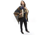 Brooks scored this cozy patterned poncho at Old Hollywood. "I love its  versatility," she explains. She pairs it with her Herms scarf, which  was passed down from her grandmother, and a lace cardigan that "I've had  forever---maybe a great-aunt made it."