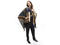 Brooks scored this cozy patterned poncho at Old Hollywood. "I love its  versatility," she explains. She pairs it with her Herms scarf, which  was passed down from her grandmother, and a lace cardigan that "I've had  forever---maybe a great-aunt made it."