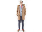 Britten models one of his favorite ensembles, consisting of a lamb's-wool sweater from Uniqlo (546 Broadway between Prince and Spring Sts, 917-237-8800  666 Fifth Ave between 52nd and 53rd Sts, 877-486-4756  uniqlo.com) and navy chinos and a detachable-fu