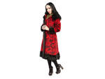 A 1960s brocade coat scored on eBay (ebay.com) makes a bold statement while allowing Crabapple to stay bundled up.