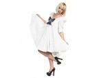 "When I was ten years old, I told my mother I would never again wear a  big, poufy dress and oversized bows; she must be gloating right now,"  says Moe, who embraces youthful girliness in this flouncy frock by  Moschino (moschino.com). She says the luxe I