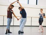 SHAPING UP Maria Kowroski looks on as Douglas Lee, center, works out a step with Amar Ramasar.