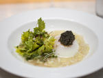 Slow-poached egg with paddlefish caviar, celery leaves and bottarga at North End Grill