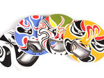 Kabuki Bottle Opener These sleek and colorful little rounds are styled after traditional Japanese dance masks. At $5 a pop, you can buy them for all your friends. Available at kikkerland.com. $5.