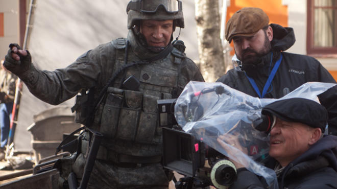 Actor-director Ralph Fiennes, left, on the set of Coriolanus