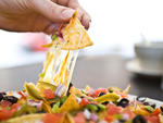 Nachos Supreme at Bar 89 This airy caf-bar may resemble a Sex and the City set, but push past the chocolate martinis and stray shopping bags to find one of the city's most progressive nacho platters. While there's nothing dainty about the dish (a half ord