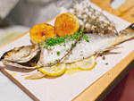 Salt-crusted branzino