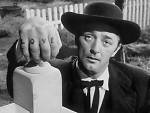 REVEREND HARRY POWELL, THE NIGHT OF THE HUNTER (1955)