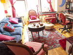 "I like mixing international objects from our travels," explains Benais. "I'm also attracted to the fantasy of the theater---deep reds and pinks." She has outfitted the apartment in flea-market finds, Craigslist scores and souvenirs in her preferred hues.