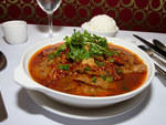 Braised beef at Lan ShengChili-heads can skip the mapo tofu and go straight for the unassumingly named braised beef: It's the spiciest item on the menu at this midtown Szechuan spot. Even the restaurant's owner, Yang Lan, finds himself sneezing when the d