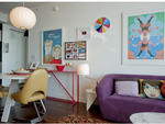 A crisp white Ikea table and yellow chairs from a Los Angeles restaurant---another eBay score---make up the dining area. Shellhammer displays a vintage Bulgarian propaganda poster on the wall next to his handmade collages.