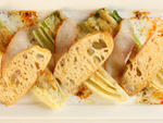 Grilled Caesar at MillesimeRomaine  lettuce, it turns out, is just as terrific hot as it is cold. A  brilliant signature dish was born when chef-owner Laurent Manrique  applied this happy realization to his Caesar salad variation, which  deploys grilled R