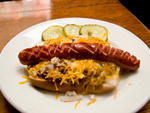 Hot dog at Old Town BarA  gang of nouveau hot dogs with haute chef pedigrees rolled into town  this year. But this simple classic---lowered from the second-floor kitchen  via an antique dumb waiter---puts the young pups to shame. The hefty  all-beef Sabre