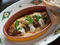 Sausage polenta at Osteria Morini The  return of sweater weather also signals the revival of this  chill-abating indulgence. Chef Michael White's stratospheric version of  creamy polenta is stocked with white pepper and funky Parmesan, spread  with a laye