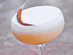 Sixth Street at PDT Playing  off the complex spicing used in abundance at the Indian restaurants  lining East 6th Street, this garnet-hued sipper kicks up gin with  piquant house-made ginger beer, a kafir-lime cordial and a pungent curry  powder. Guava pu