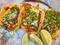 Al pastor tacos at Taco MixThe signature al  pastor pork is sliced directly from the spit at this Spanish Harlem  hole-in-the-wall, which is so tiny that you have to eat standing up.  You'll forget about the cramped quarters as soon as you taste that juic