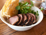 Duck lunch at Momofuku Ssm BarDavid  Chang is well-known for putting pork on a pedestal. With his new fancy  rotisserie, he's thrusting duck up there too, roasting boutique-farm  birds to a gorgeous caramel sheen. A whole duck is the centerpiece of  the b