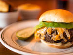 The Cardinal This refreshingly simple cheeseburger reminds us of the best kind of  backyard cookout. While there's no charcoal grill hiding in his kitchen,  North Carolina native Curtis Brown does right by the proprietary  Ottomanelli Brothers patty, trap