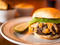 The Cardinal This refreshingly simple cheeseburger reminds us of the best kind of  backyard cookout. While there's no charcoal grill hiding in his kitchen,  North Carolina native Curtis Brown does right by the proprietary  Ottomanelli Brothers patty, trap