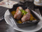 Beaujolais sausages made with pork, mushrooms, onions, bacon and red wine, and served with lentils.