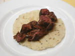 Tamarind-glazed hanger steak on a manteca-enhanced tortilla
