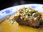 Shortribs Kare-Kare with coconut, peanuts, pickled chilies at Talde