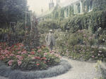 Claude Monet in front of his house at Giverny