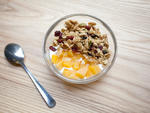 House-made yogurt with granola and seasonal fruit compote at One Girl Cookies