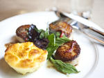 Scallops and corn pudding at The Spotted Pig