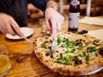 Dig into gorgeously blistered pizza pies at the new Prospect Heights location of Franny's