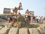 Watch artists make masterpieces by the sea at Creative Time’s second annual Sandcastle Competition in Far Rockaway, one of the best things to do in the summer. Pictured: 2012's winning team of Jen Catron and Paul Outlaw.