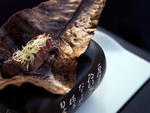 Australian wagyu on houba (magnolia leaf) with red miso sauce at n/naka