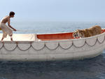 Suraj Sharma and a Bengal tiger named Richard Parker in Life of Pi