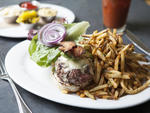 Pug burger with fries at The Hungry Cat