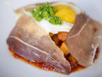 Sunny side up duck egg, jamon, romesco and patatas bravas at Superba Snack Bar