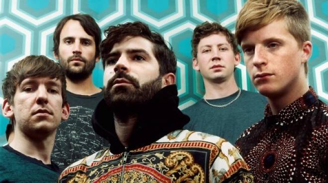 Horse power: Yannis Philippakis (centre) and Jimmy Smith (second left) with Foals