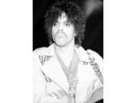 Prince performs on stage at Flipper's Roller Disco Boogie Lounge on March 31, 1981 in Los Angeles, California.