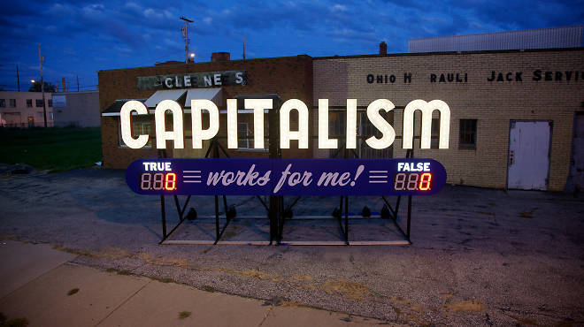 Capitalism Works For Me! (True/False) by Steve Lambert, appears in Times Square as part of Crossing the Line 2013
