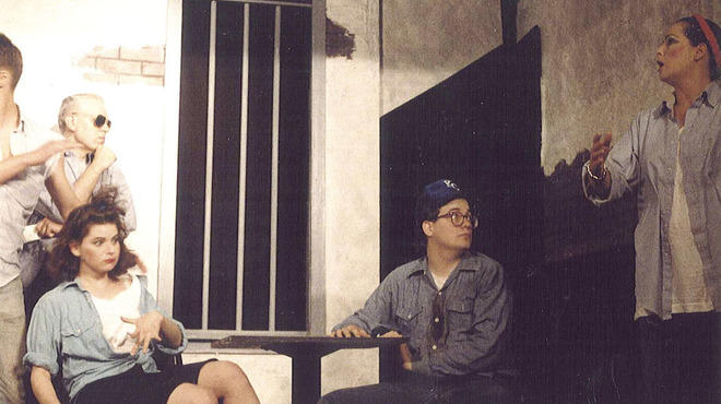 Susan Messing (far left) as Alice and Ellen Stoneking as Dame Toulouse (far right) in Co-ed Prison Sluts, 1989