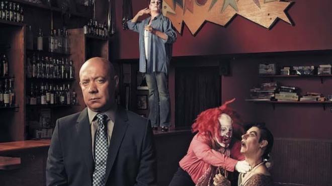 Mick Napier oversees a reenactment of a famous Co-Ed Prison Sluts scene, in which a clown fights a drag queen (Annoyance regulars Clay Goodpasture and Kyle Dolan, respectively), while an inmate (veteran Annoyance actress Ellen Stoneking) looks on.
