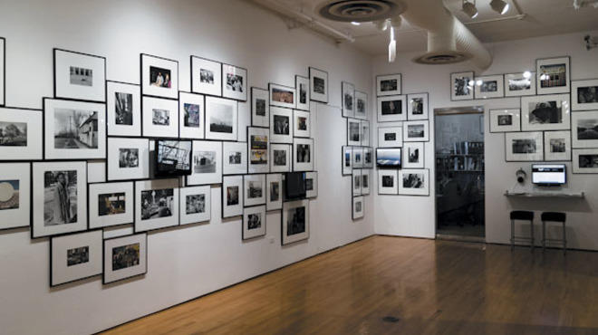 Installation view of "1979:1-2012:21: Jan TIchy Works with the MoCP Collection" at the Museum of Contemporary Photography, 2012.