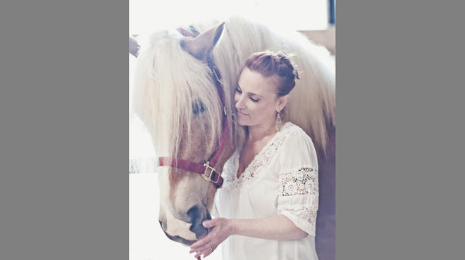 Portrait of Mindy Segal with Bubba the horse at Nobel Horse Theater. TOC 375.