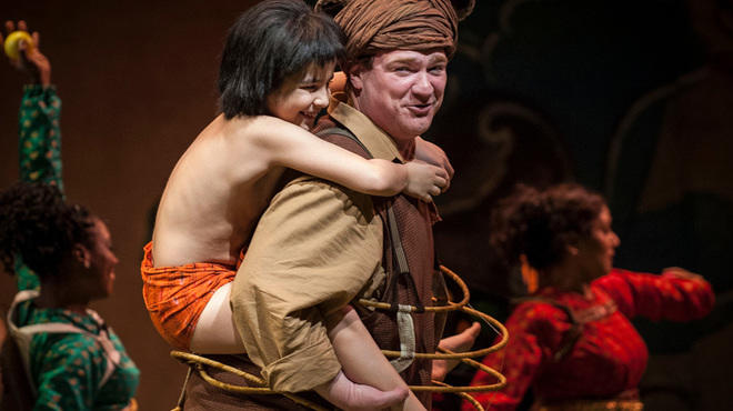 Akash Chopra (Mowgli) and Kevin Carolan (Baloo) in The Jungle Book at Goodman Theatre