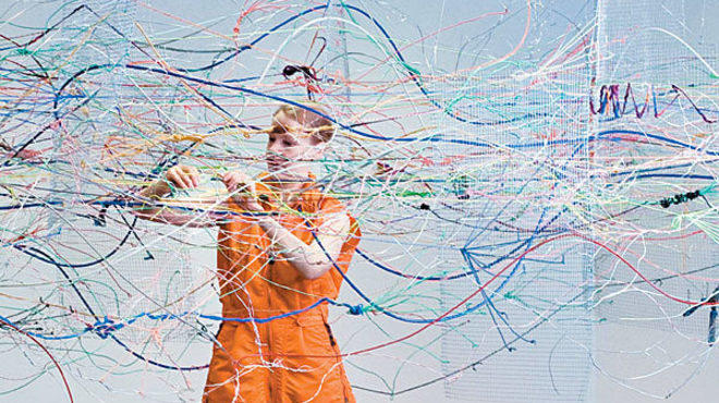 STRINGS ATTACHED Pop-Up Art Loop artist Sara Schnadt works on a site-specific installation at the Museum of Contemporary Art in 2007.